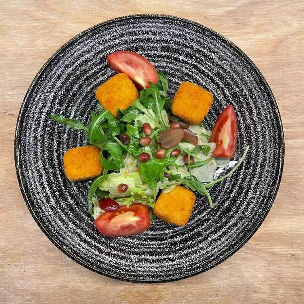 Salad with fried suluguni cheese